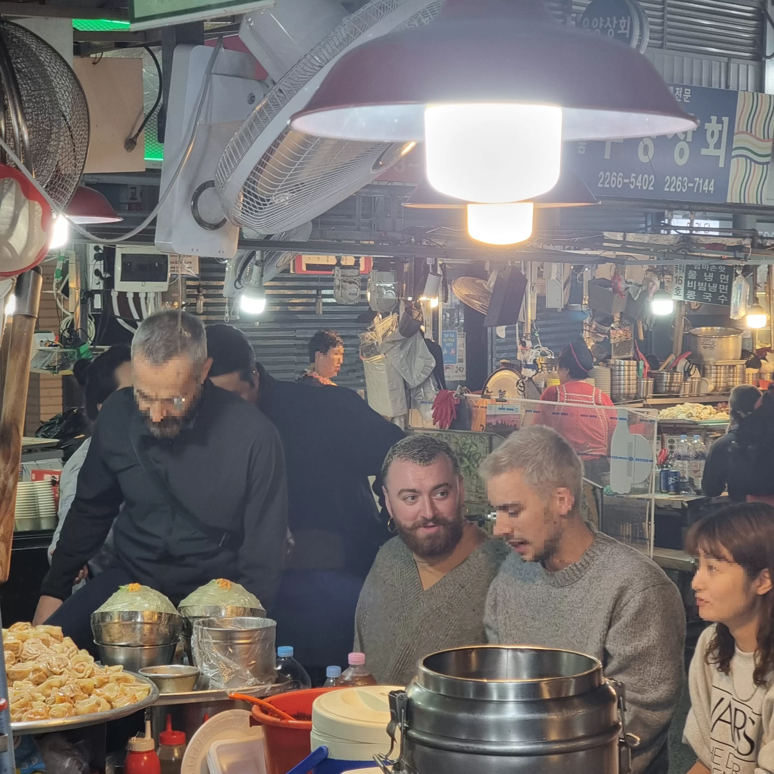 Sam Smith is enjoying Korean food at Gwangjang Market